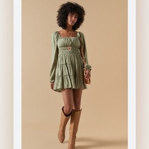 Olive ruffle long sleeve mini dress. Bohemian